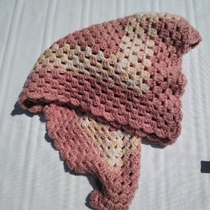 Hand knit light pink and cream baby blanket